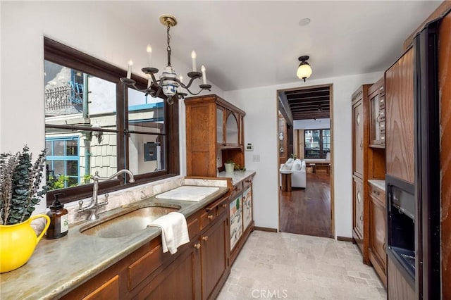 115 Apolena Ave, Newport Beach, CA 92662 - bathroom with a chandelier, stone finish floors, baseboards, and vanity