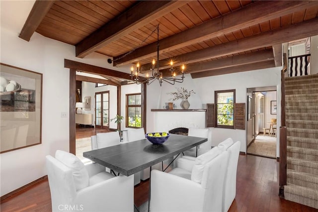115 Apolena Ave, Newport Beach, CA 92662 - dining room featuring a chandelier, stairway, wood ceiling with exposed beams, a brick fireplace, and dark wood-style floors
