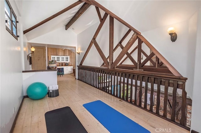 115 Apolena Ave, Newport Beach, CA 92662 - exercise area featuring hardwood / wood-style floors, vaulted ceiling, and baseboards
