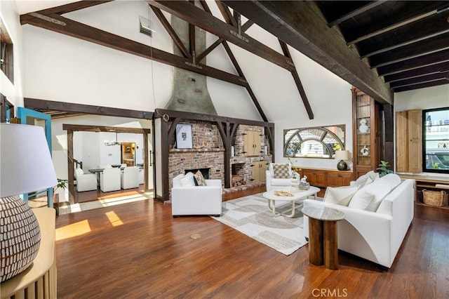 115 Apolena Ave, Newport Beach, CA 92662 - living area with high vaulted ceiling, a brick fireplace, beam ceiling, plenty of natural light, and a chandelier