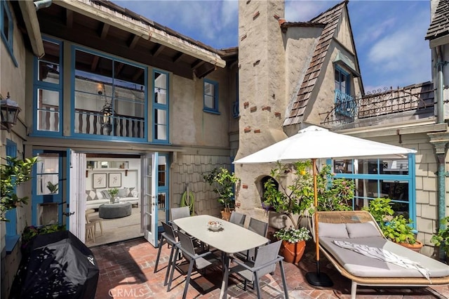115 Apolena Ave, Newport Beach, CA 92662 - view of patio / terrace with a balcony and outdoor dining space