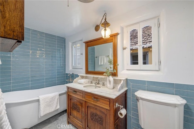 115 Apolena Ave, Newport Beach, CA 92662 - bathroom featuring tile walls, a bathtub, vanity, and toilet