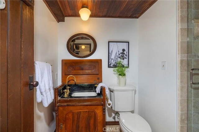 115 Apolena Ave, Newport Beach, CA 92662 - bathroom featuring wooden ceiling, vanity, toilet, ornamental molding, and tiled shower