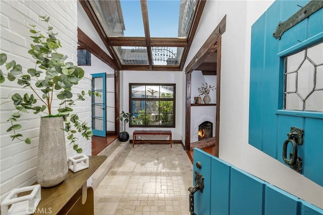 115 Apolena Ave, Newport Beach, CA 92662 - foyer with a skylight and a warm lit fireplace