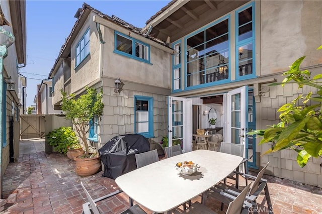 115 Apolena Ave, Newport Beach, CA 92662 - view of patio / terrace featuring a grill, a gate, and outdoor dining area