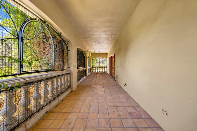 hallway with light tile patterned floors