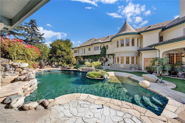 view of pool with a patio area