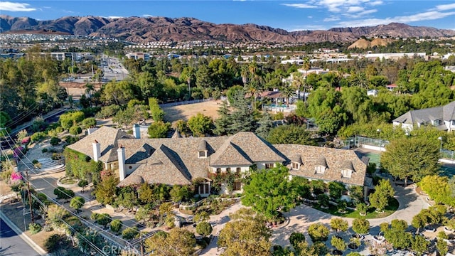 drone / aerial view featuring a mountain view