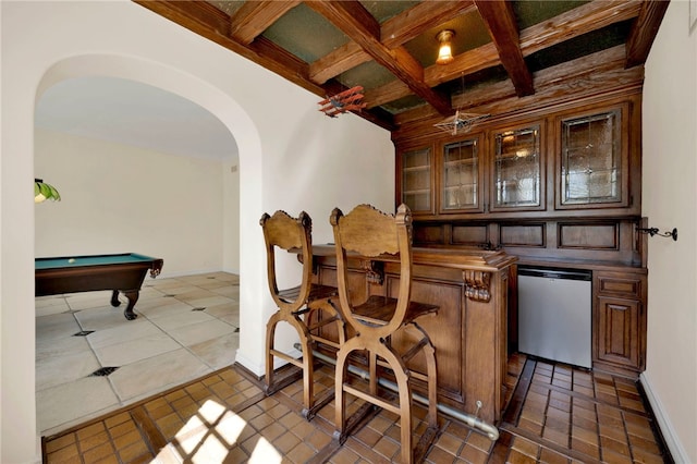 bar with pool table, tile patterned flooring, beamed ceiling, coffered ceiling, and stainless steel dishwasher