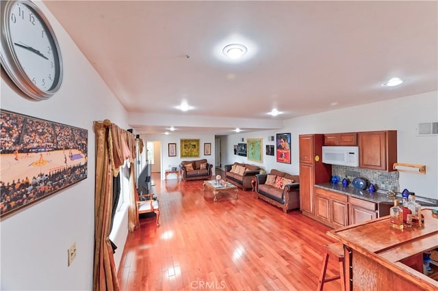 living room featuring light wood-type flooring