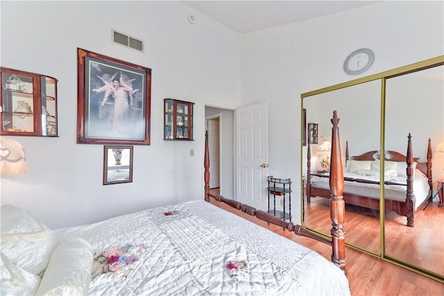 bedroom featuring a closet and hardwood / wood-style flooring