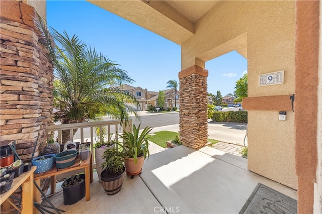 view of patio / terrace with a balcony