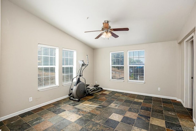 workout room featuring ceiling fan and lofted ceiling