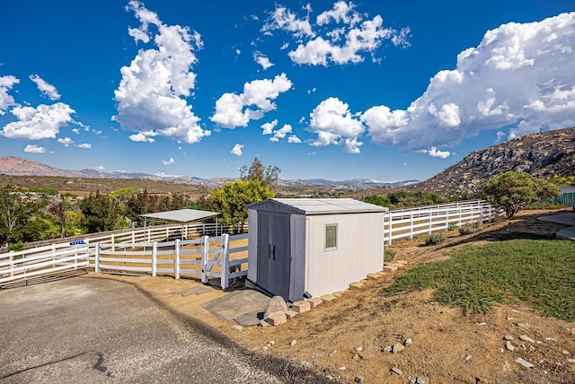 view of outdoor structure featuring a mountain view