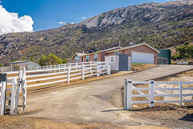 property view of mountains featuring a rural view