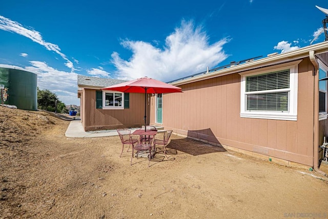 rear view of house with a patio