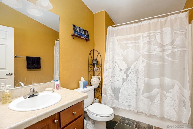 full bathroom featuring vanity, shower / tub combo, toilet, and tile patterned floors