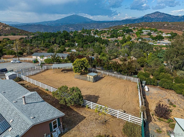 aerial view with a mountain view and a rural view