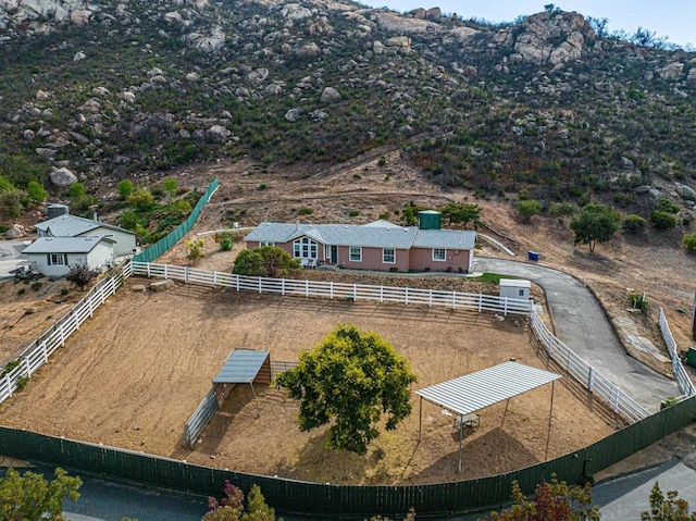 aerial view featuring a mountain view and a rural view