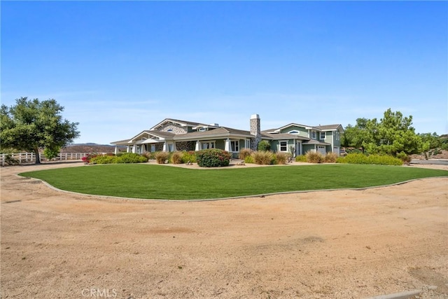 view of front of property with a front lawn