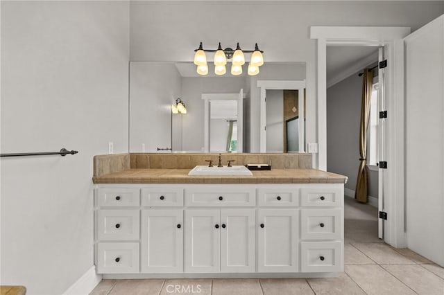 bathroom featuring vanity and tile patterned flooring