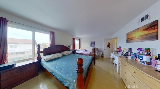 bedroom featuring light hardwood / wood-style flooring