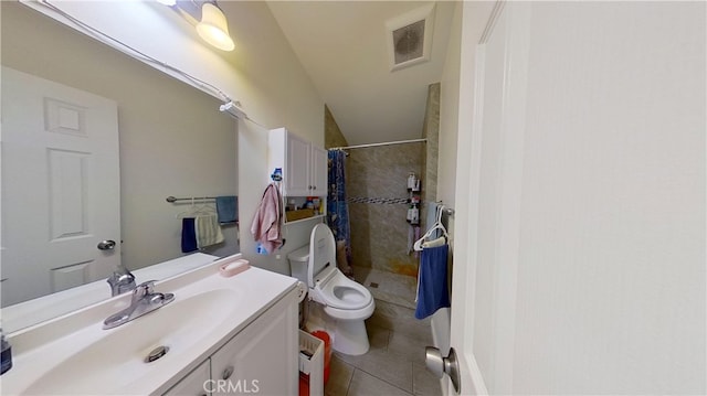 bathroom featuring walk in shower, toilet, tile patterned floors, lofted ceiling, and vanity