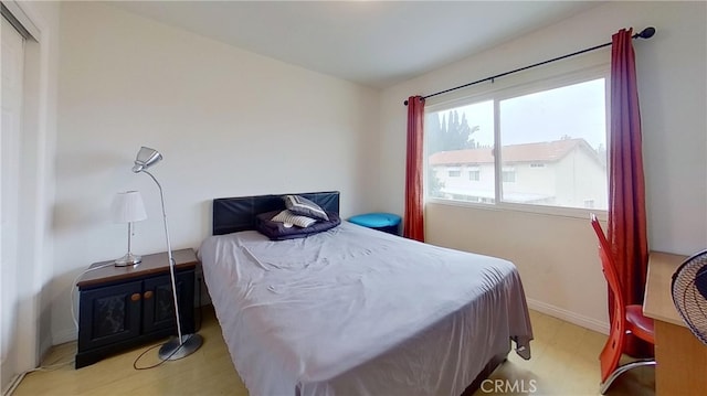 bedroom with light hardwood / wood-style floors