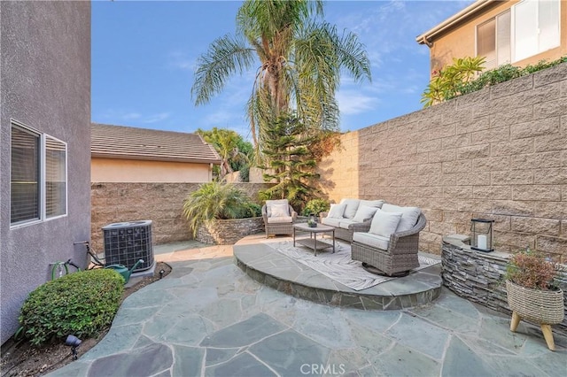 view of patio with an outdoor hangout area and central AC unit