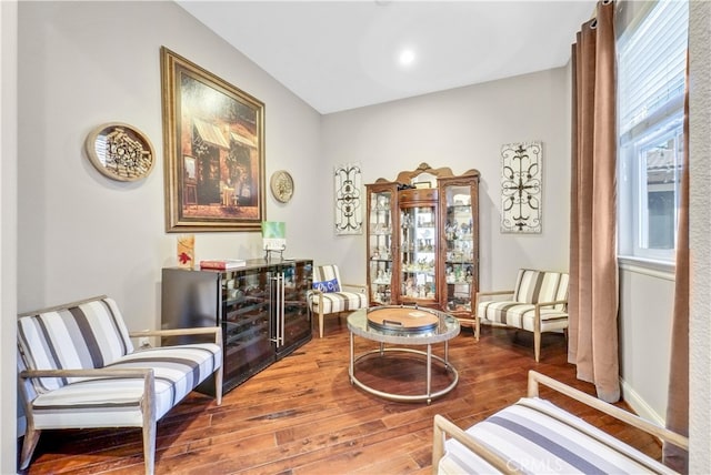 sitting room with hardwood / wood-style floors