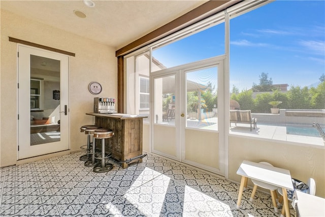 sunroom with bar area