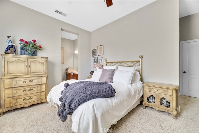 bedroom featuring light carpet and ceiling fan