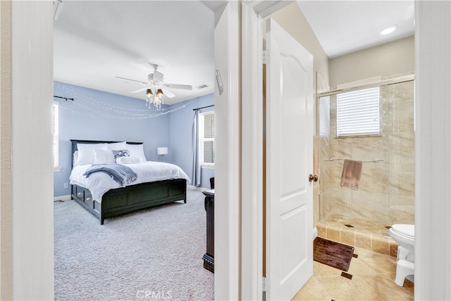 carpeted bedroom with ceiling fan