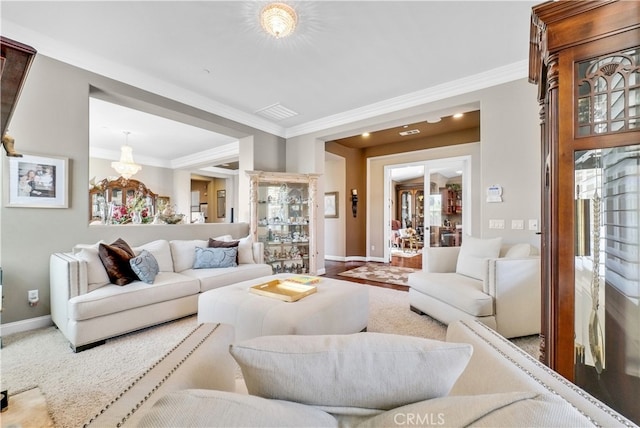 living room with ornamental molding