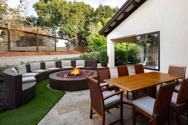 view of patio featuring a fire pit