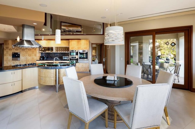 dining area with light tile patterned floors