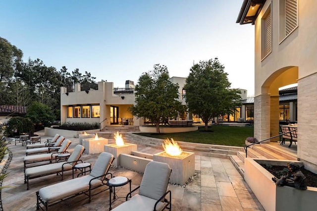 view of patio / terrace featuring a fire pit