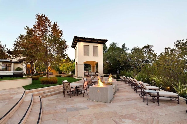 view of patio featuring a fire pit