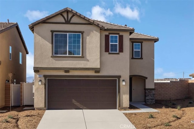 view of front of property with a garage