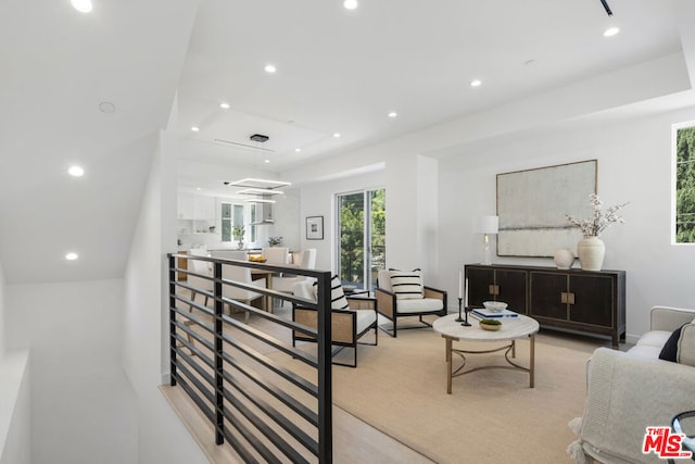 living room with light colored carpet