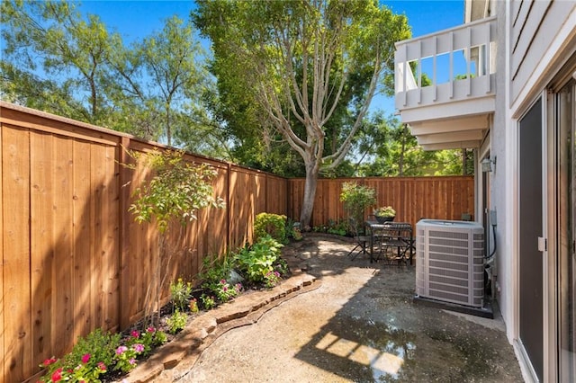 view of patio featuring central air condition unit