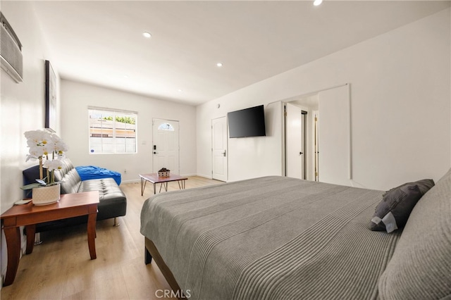 bedroom with light wood-type flooring