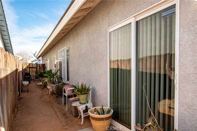 view of property exterior with a patio