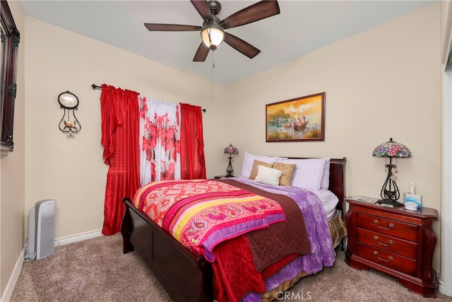 bedroom featuring ceiling fan and light colored carpet