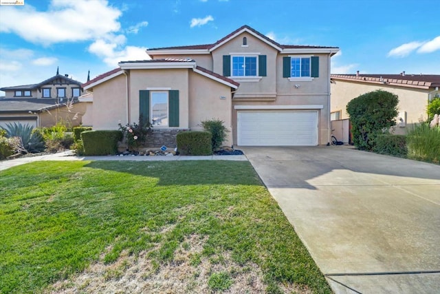 front facade featuring a garage and a front lawn