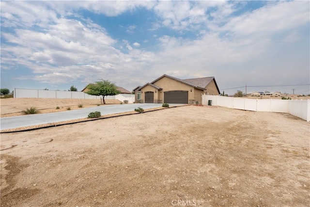 view of yard featuring a garage