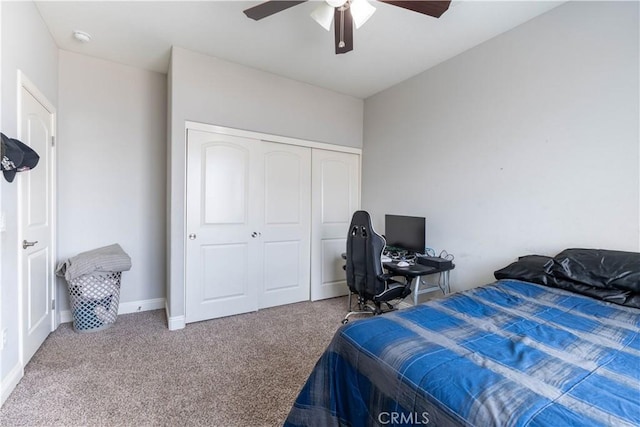 bedroom featuring carpet, ceiling fan, and a closet