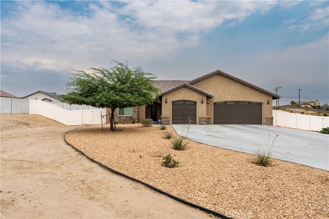 view of front of home featuring a garage