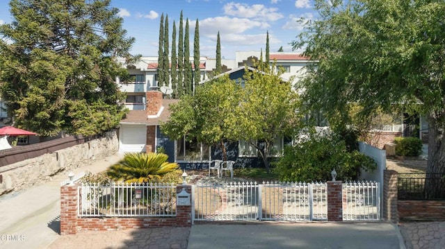 view of property hidden behind natural elements