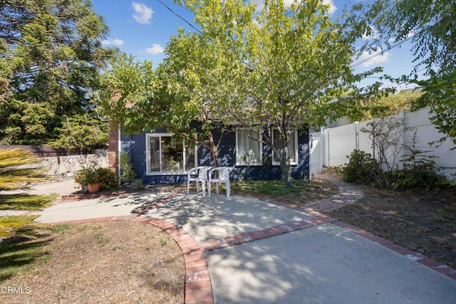 view of front of house with a patio